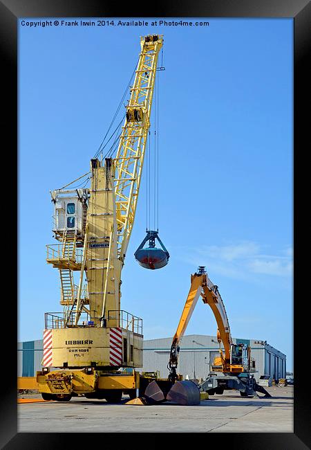 Dockside cranes with clamshell buckets Framed Print by Frank Irwin