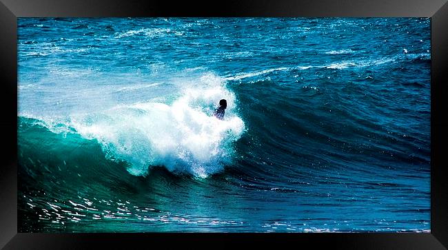 IN THE SURF Framed Print by Anthony Kellaway