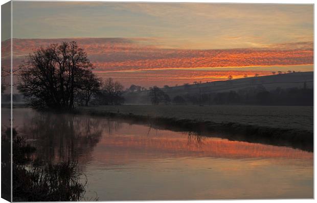 Sunrise over the River Culm Canvas Print by Pete Hemington