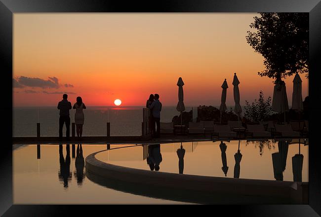 Sunset in Corfu Framed Print by Graeme Raffan