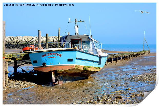 A fishing boat sits high and dry in Rhos-on-Sea Print by Frank Irwin