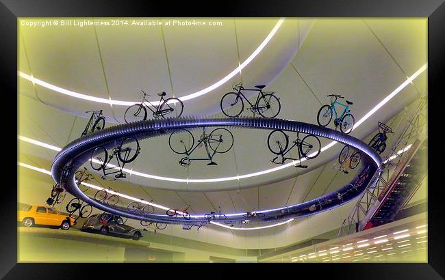 The Flying Bikes ! Framed Print by Bill Lighterness