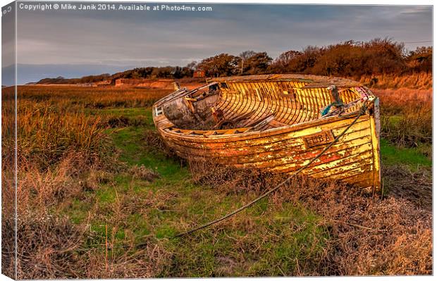 Emba Abandoned Boat Canvas Print by Mike Janik