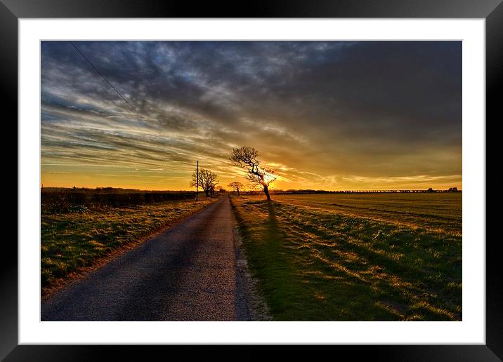 The road in to Ringstead Framed Mounted Print by Gary Pearson