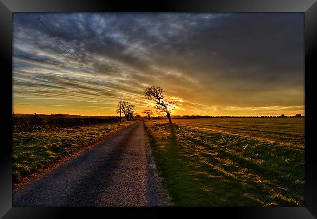 The road in to Ringstead Framed Print by Gary Pearson