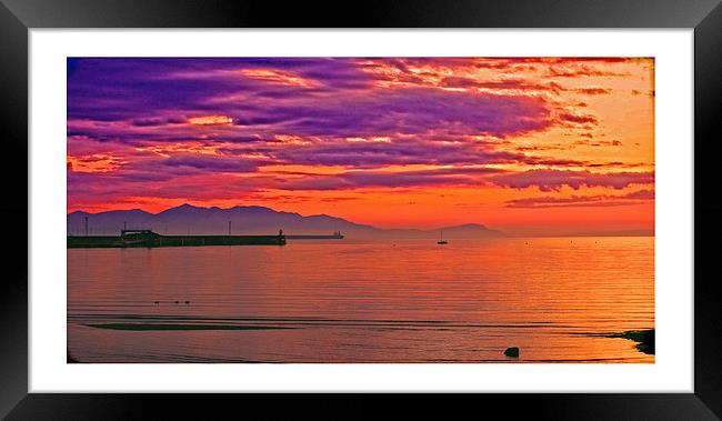 sunsetting over Arran Framed Print by jane dickie