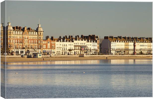 Sunrise ver Weymouth Bay Canvas Print by Paul Brewer
