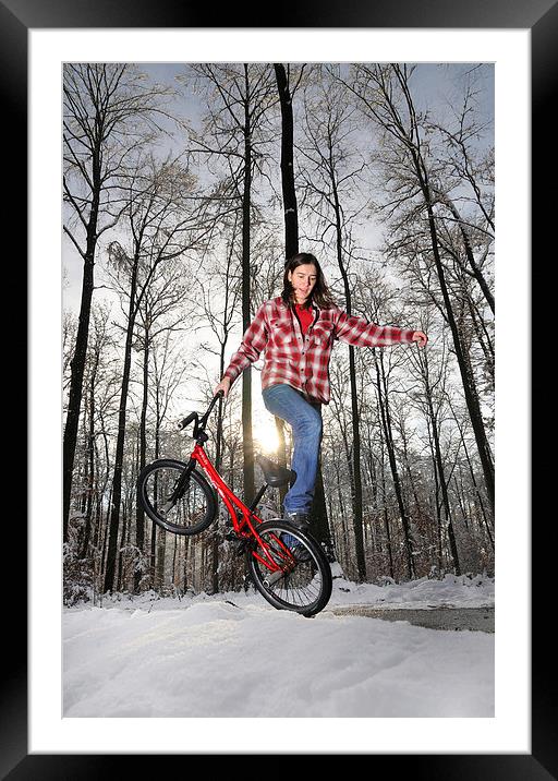 BMX Flatland rider in winter Framed Mounted Print by Matthias Hauser
