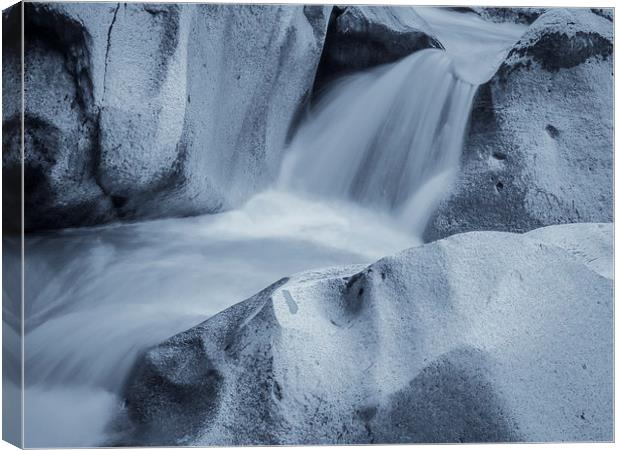 Rocks shaped by water Canvas Print by Jan Venter