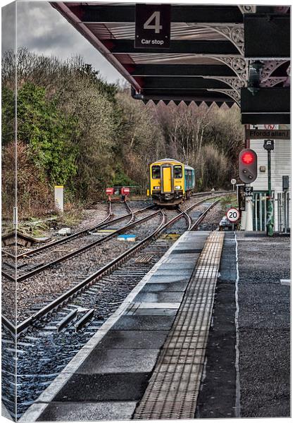 The Train Now Arriving At Canvas Print by Steve Purnell