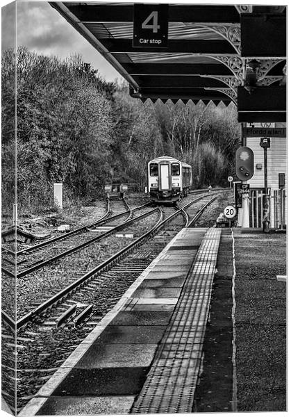 The Train Now Arriving At mono Canvas Print by Steve Purnell