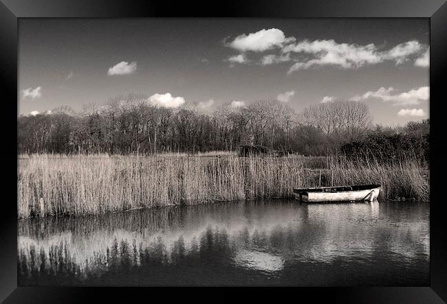 Lonely Rowing Boat Framed Print by Steve Hardiman