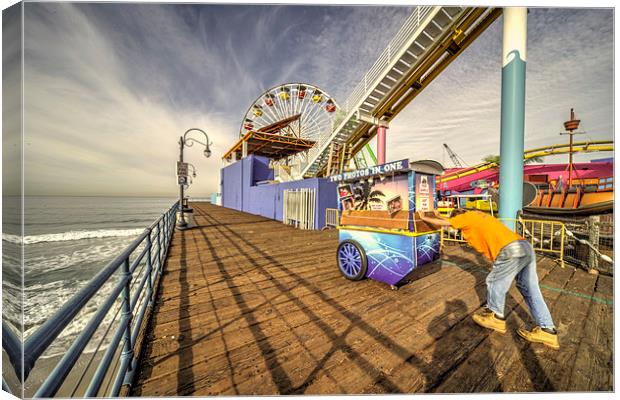 Pushing on the pier Canvas Print by Rob Hawkins