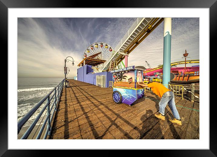 Pushing on the pier Framed Mounted Print by Rob Hawkins