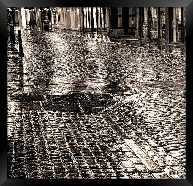 Chester cobbles at night Framed Print by Rick Lindley