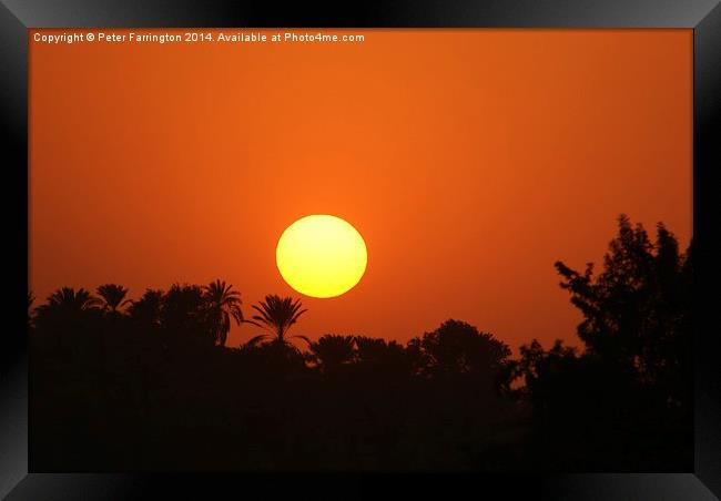 Sunset over the Nile Framed Print by Peter Farrington