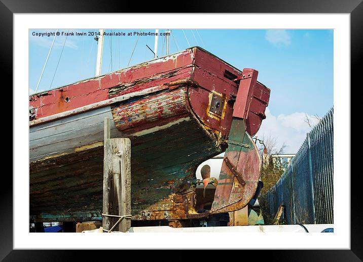 The stern of a boat at Heswall Beach Framed Mounted Print by Frank Irwin