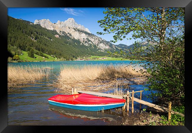 Red boat lake and mountains Framed Print by Matthias Hauser