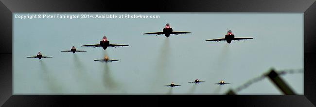 Reds take to the skies Framed Print by Peter Farrington
