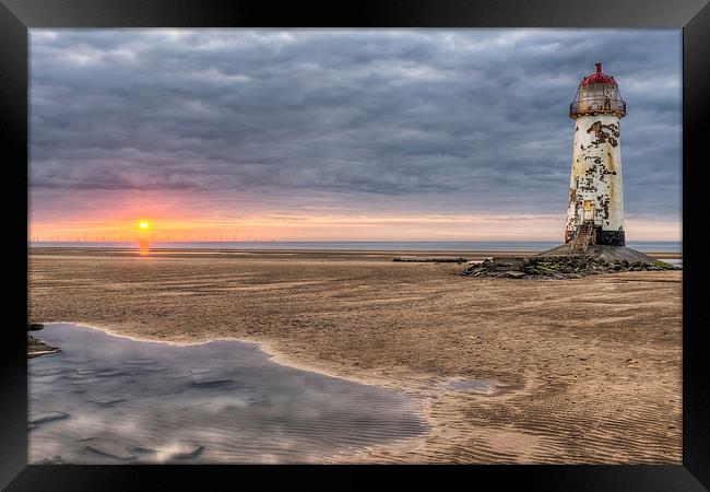 Lighthouse Sunset Framed Print by Adrian Evans