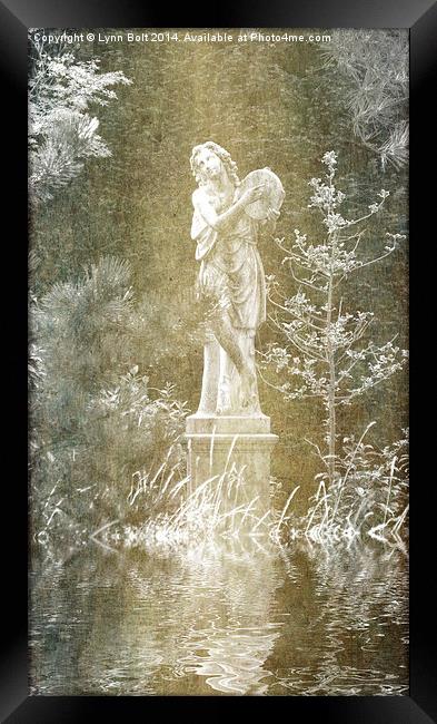 Statue by the Pond Framed Print by Lynn Bolt
