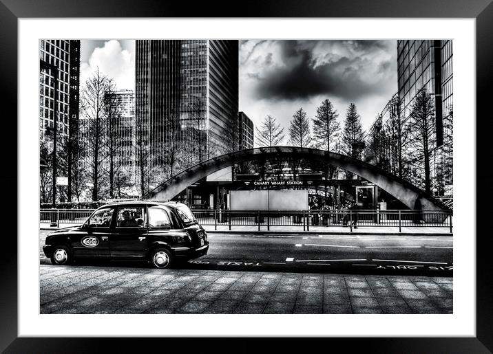 Taxi at Canary Wharf Framed Mounted Print by David Pyatt