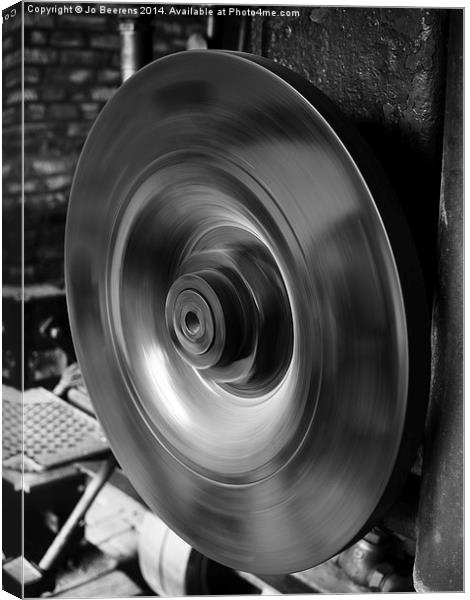 wheel in motion Canvas Print by Jo Beerens
