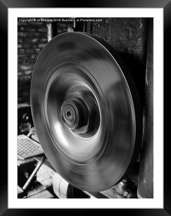 wheel in motion Framed Mounted Print by Jo Beerens