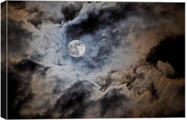 Shrouded Moon Canvas Print by John Biggadike