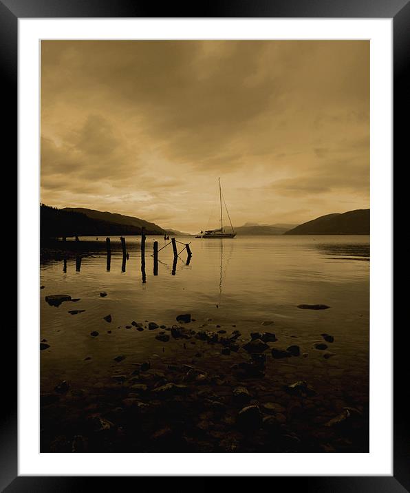 boat on loch ness at night Framed Mounted Print by john maclean