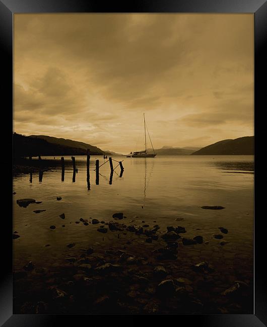 boat on loch ness at night Framed Print by john maclean