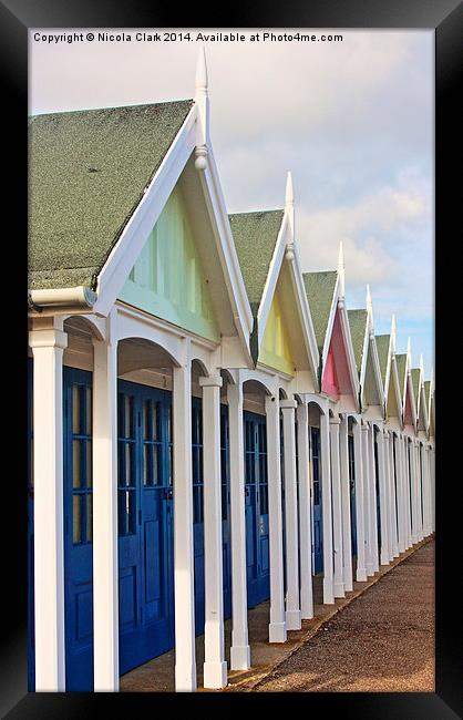 Beach Huts Framed Print by Nicola Clark