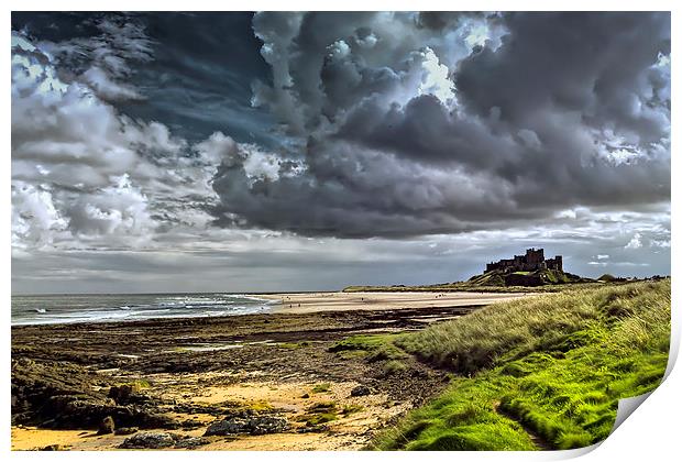 Dramatic skys over Bamburgh Castle and beach Print by Kevin Tate