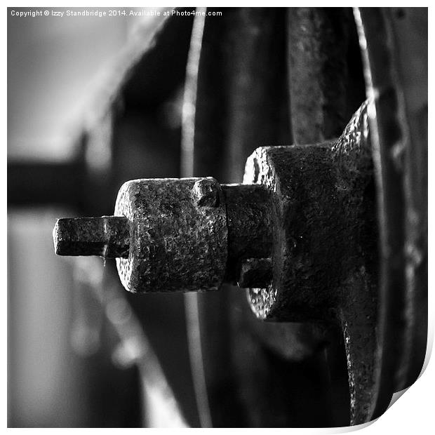 Antique wheel on large machinery Print by Izzy Standbridge