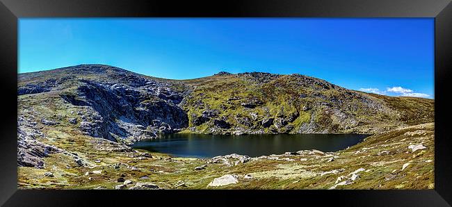 A Mountain Lake Framed Print by Mark Lucey