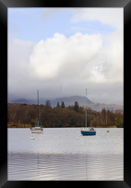 White clouds & small yachts Framed Print by Steven Plowman