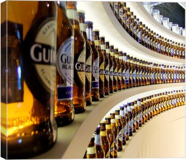 GUINNESS BOTTLES Canvas Print by Anthony Kellaway