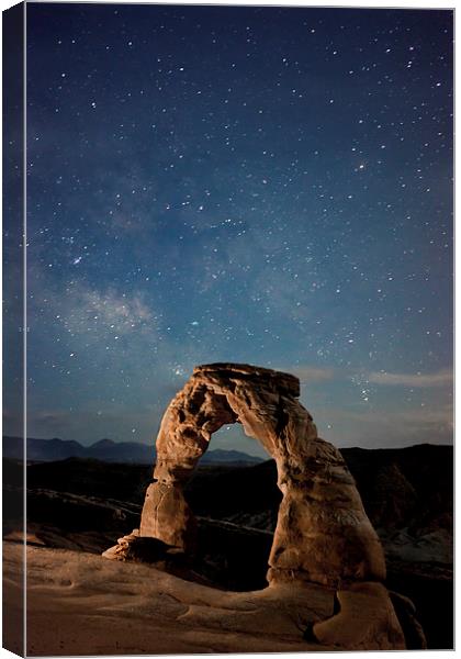 Delicate Arch at night, Utah. Canvas Print by Luc Novovitch