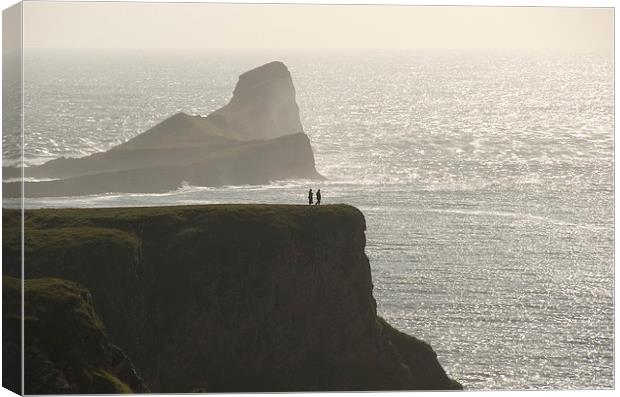 Two People on Cliff, Gower Canvas Print by Bernd Tschakert