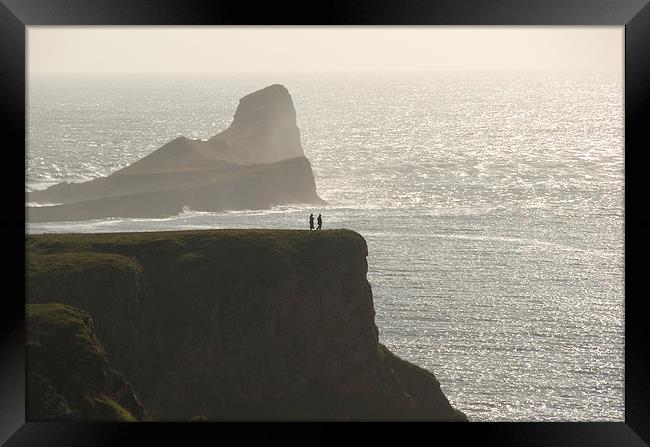 Two People on Cliff, Gower Framed Print by Bernd Tschakert