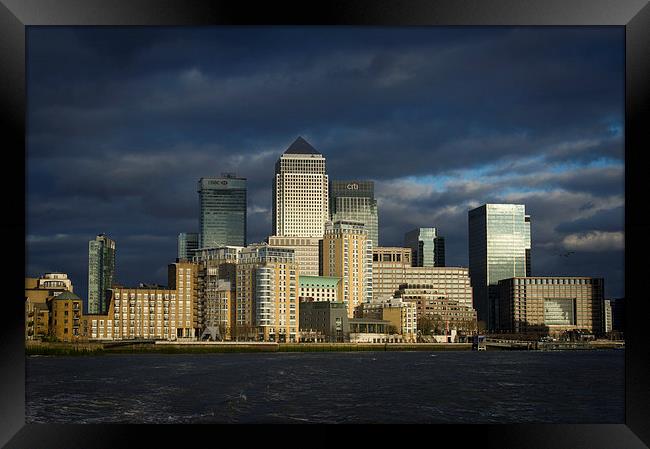Canary Wharf sunlit from the Thames Framed Print by Gary Eason