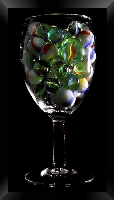 a glass of Marbles Framed Print by Doug McRae