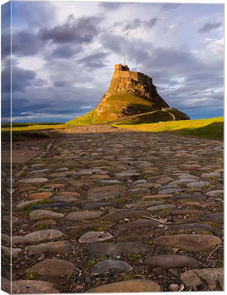 Sunset over Lindisfarne priory Canvas Print by Richard Armstrong