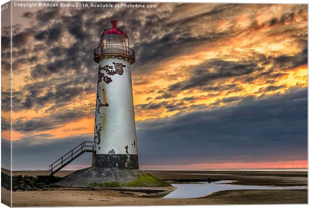Sunset Lighthouse Canvas Print by Adrian Evans