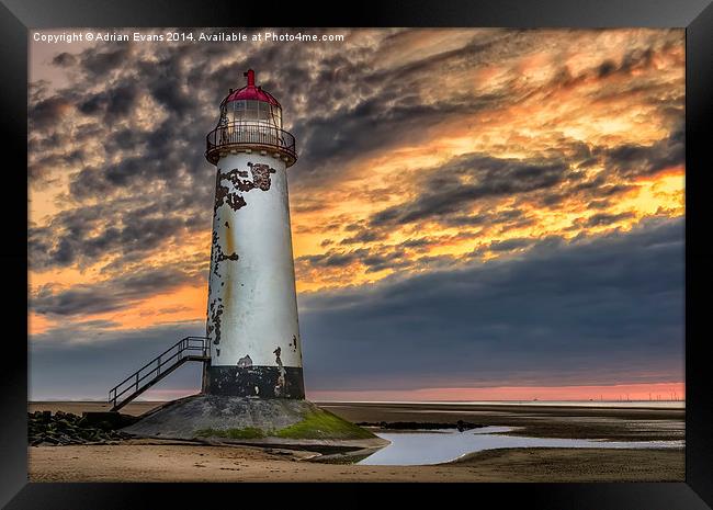 Sunset Lighthouse Framed Print by Adrian Evans