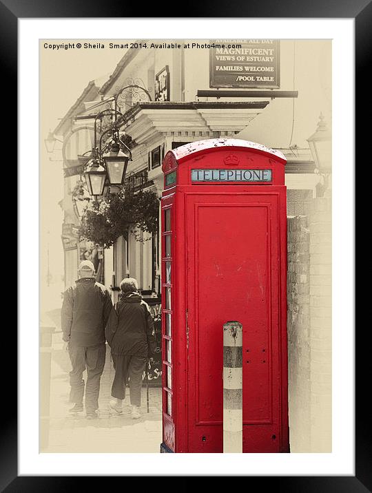 The red telephone box Framed Mounted Print by Sheila Smart