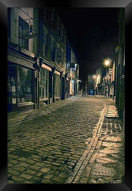 Whitby Street at Night Framed Print by Ann Garrett