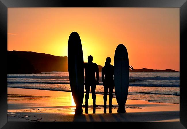 Sunset Surfers Framed Print by Kelvin Brownsword