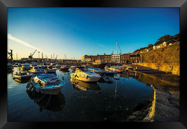 St Hellier Harbour Framed Print by Rob Hawkins