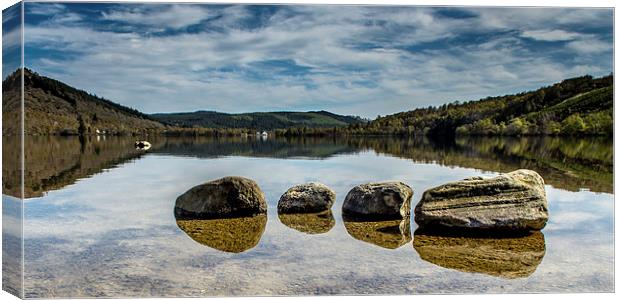 Reflections of Loch Achilty Canvas Print by Michael Moverley